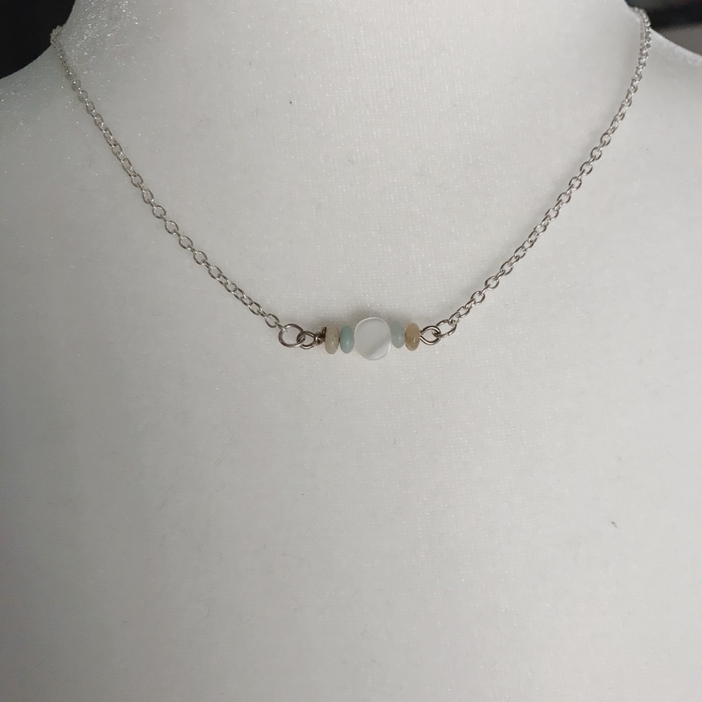 Silver necklace with silver clasp and beads